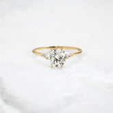 golden-timeless-path-three-stone-round-glow-engagement-ring-1-5-ct-yellow-gold-gemfora-1